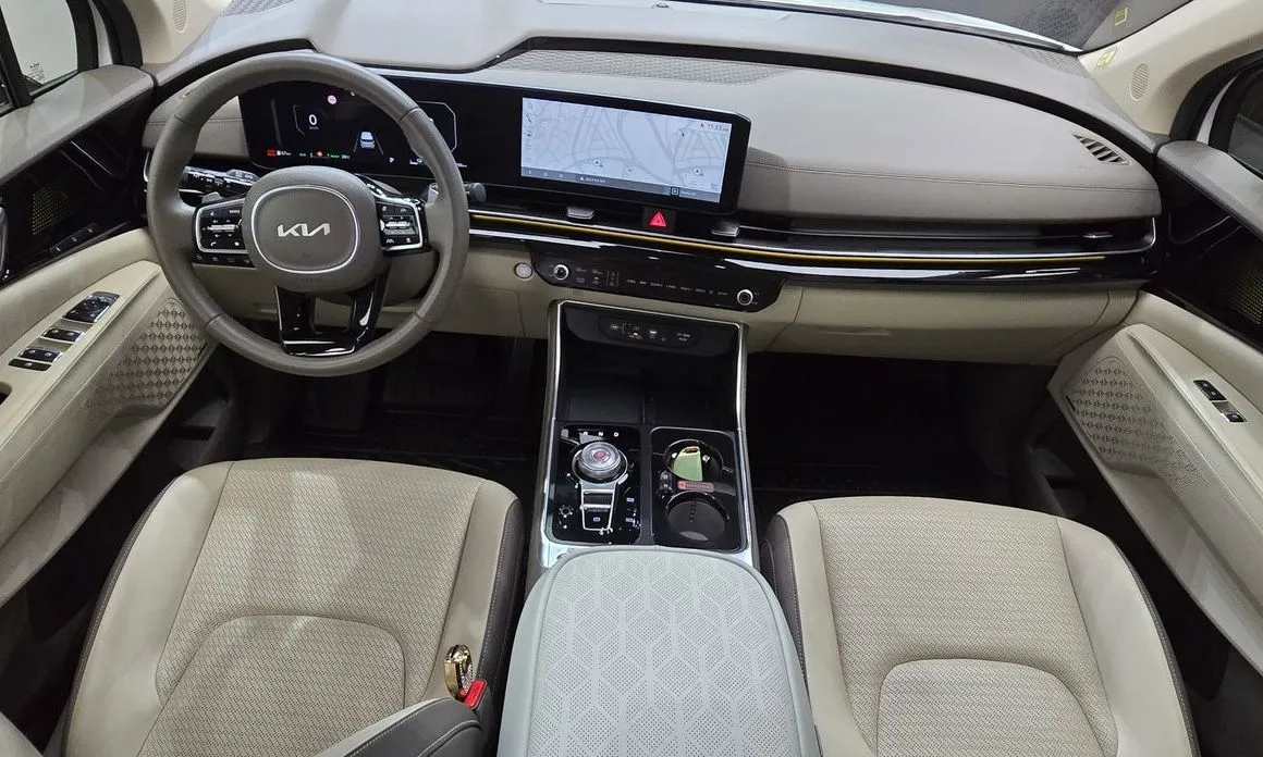 Kia Carnival — фото 10