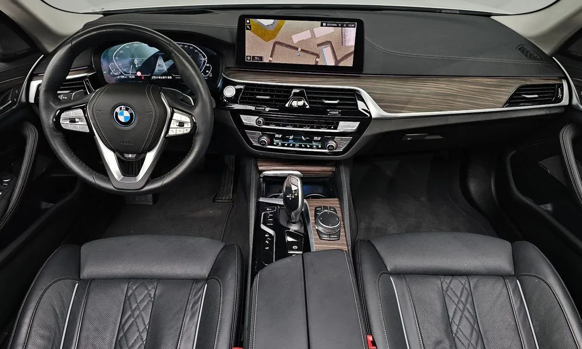 BMW 5-Series — фото 10