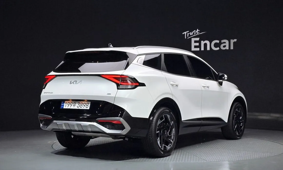 Kia Sportage — фото 7