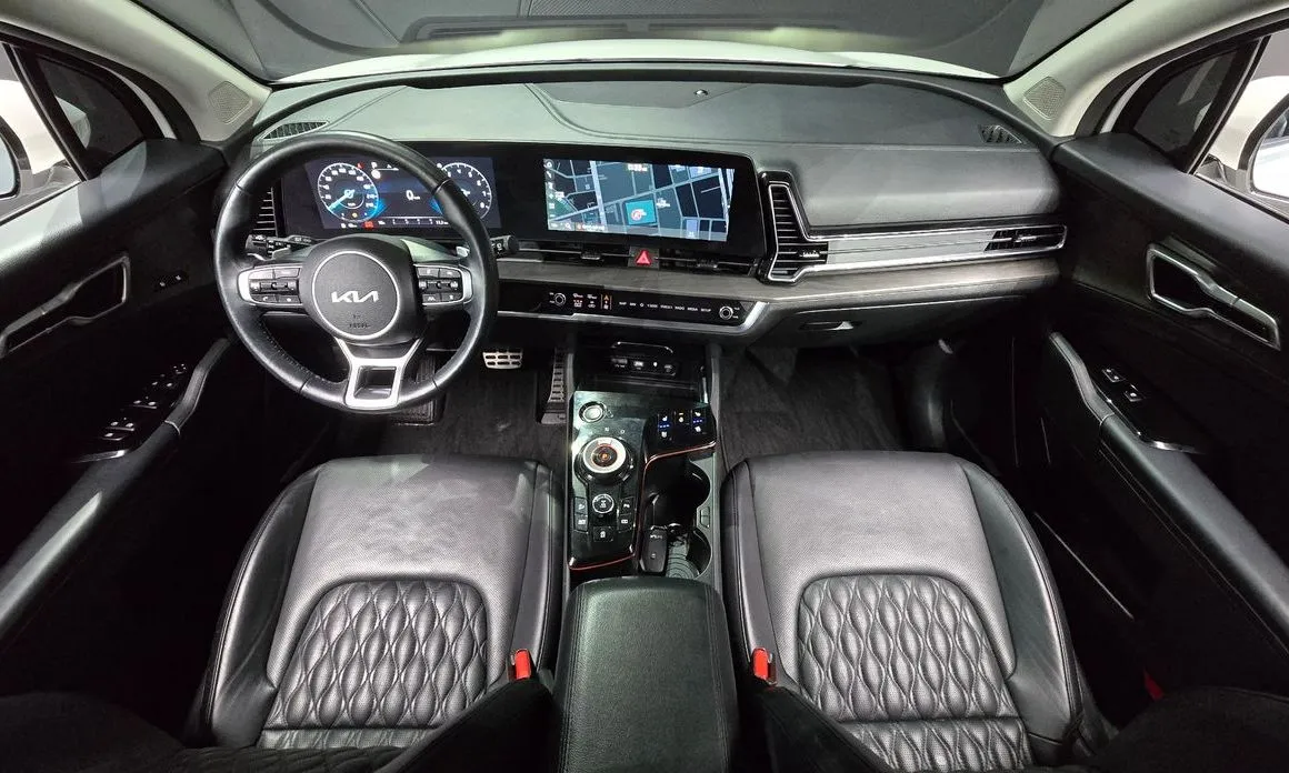 Kia Sportage — фото 10