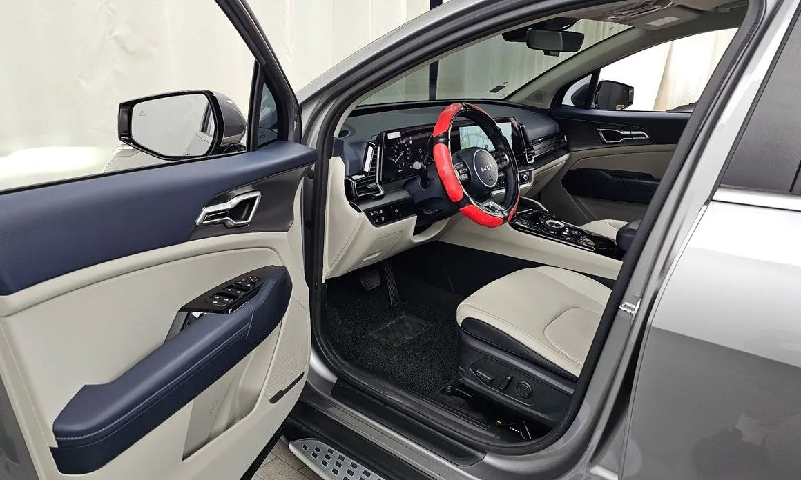 Kia Sportage — фото 8