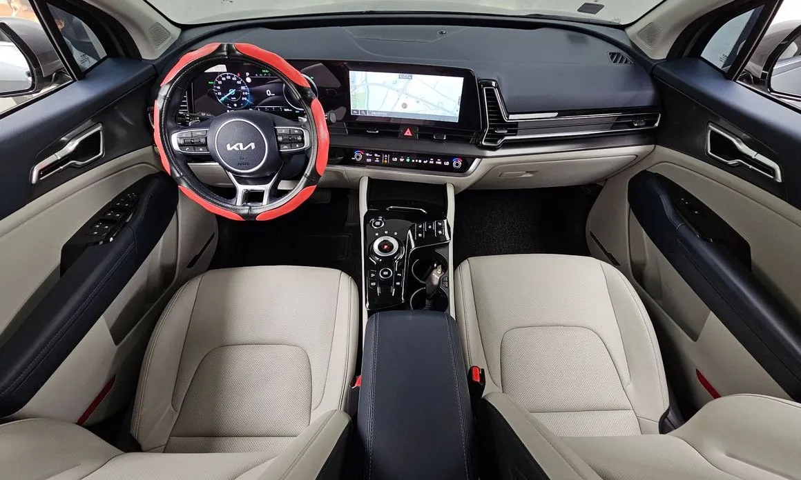 Kia Sportage — фото 10