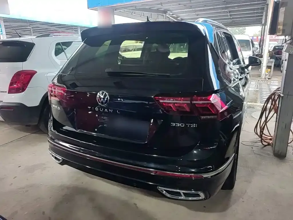 Volkswagen Tiguan L — фото 10