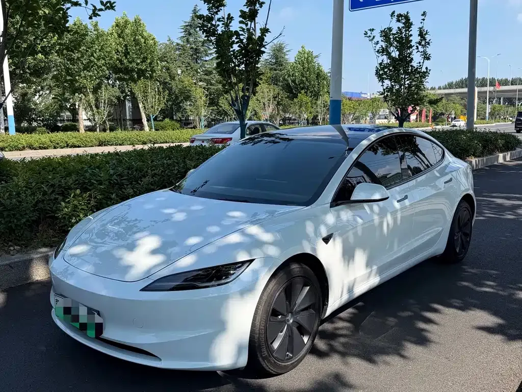 Tesla Model 3 — фото 10