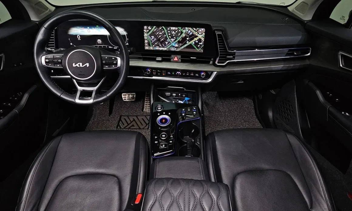 Kia Sportage — фото 10