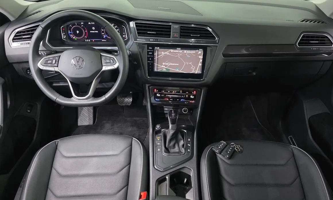 Volkswagen Tiguan — фото 9