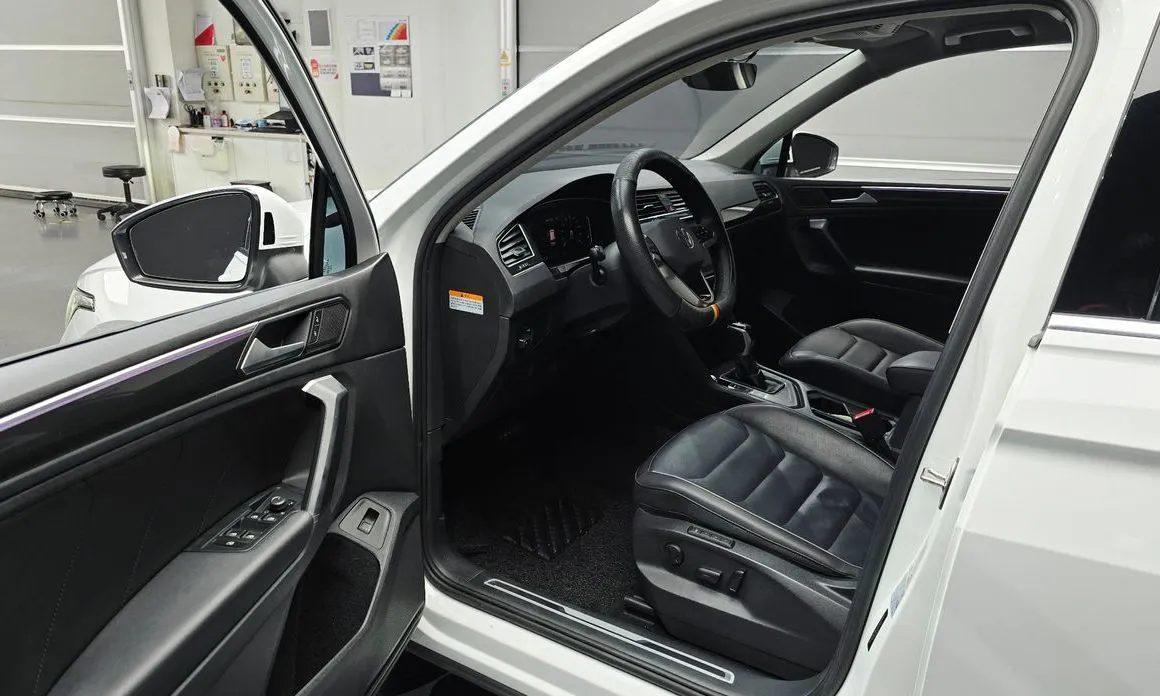 Volkswagen Tiguan — фото 9