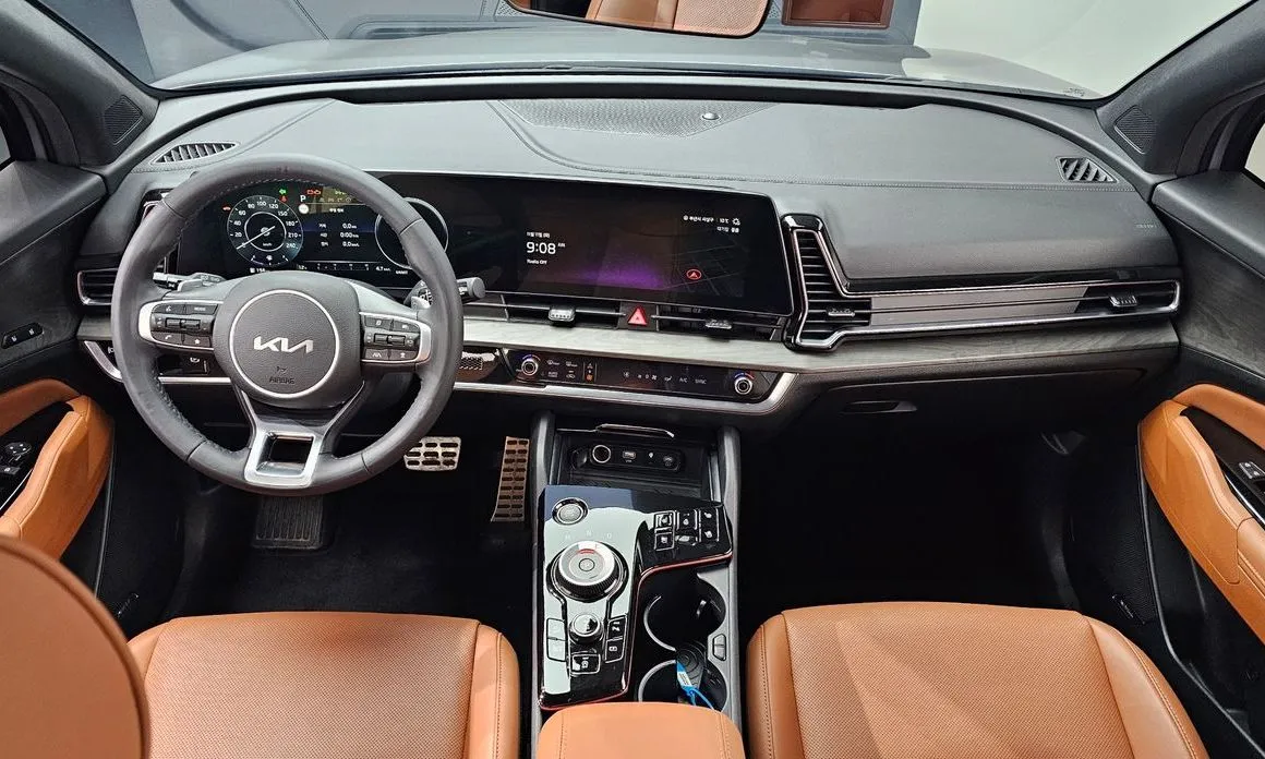 Kia Sportage — фото 10