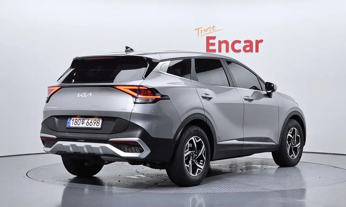 Kia Sportage — фото 10