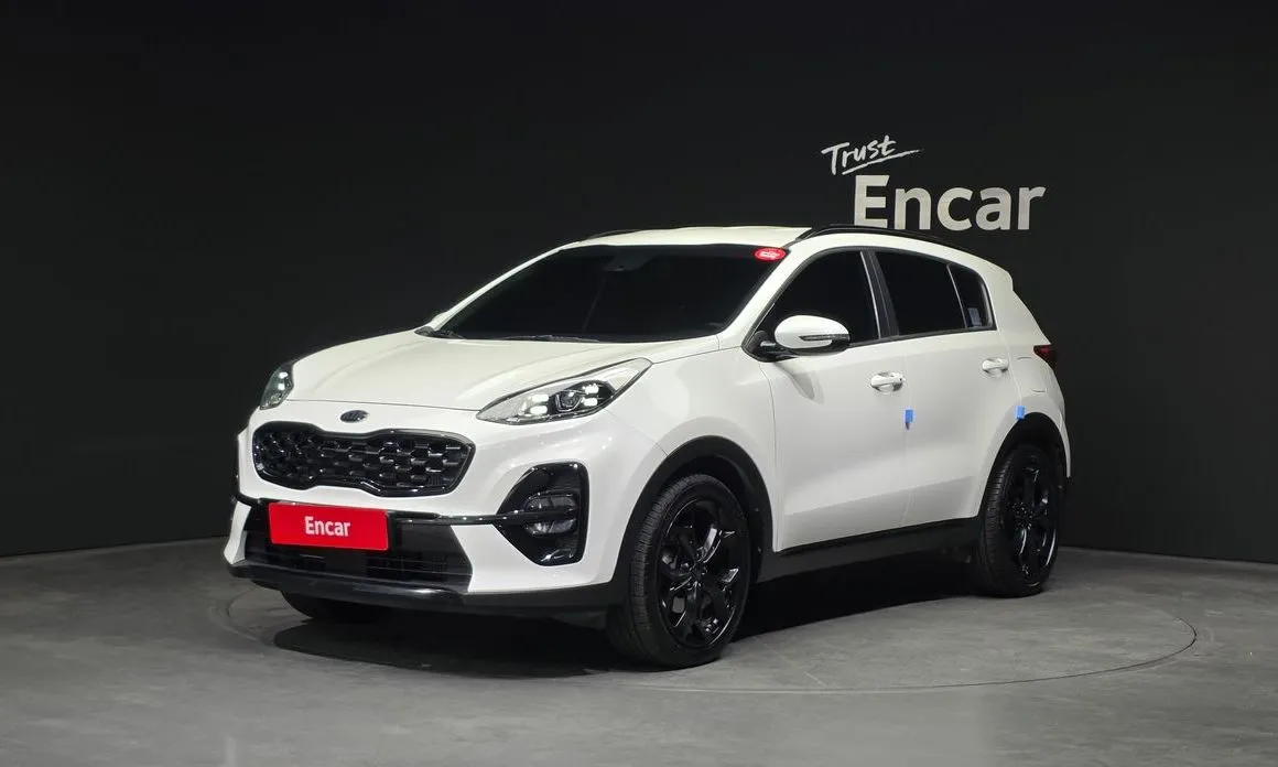 Kia Sportage — фото 1