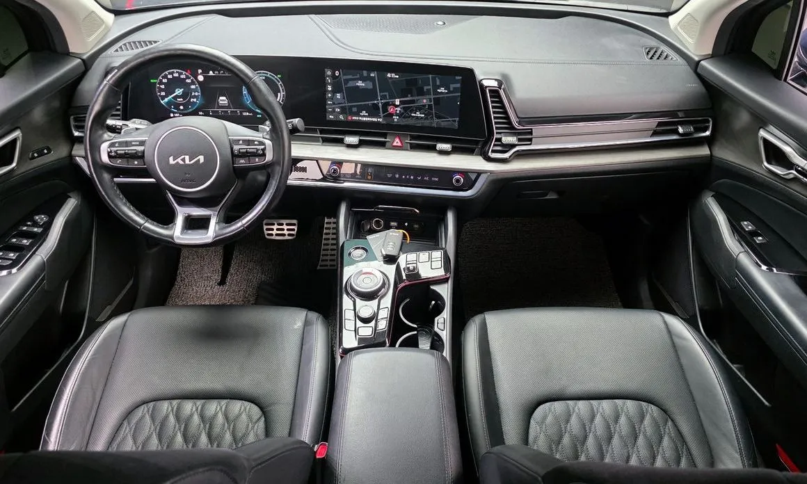 Kia Sportage — фото 10