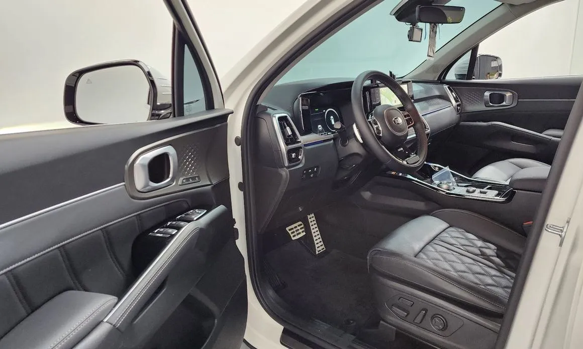 Kia Sorento — фото 7