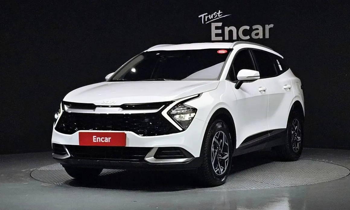 Kia Sportage — фото 1
