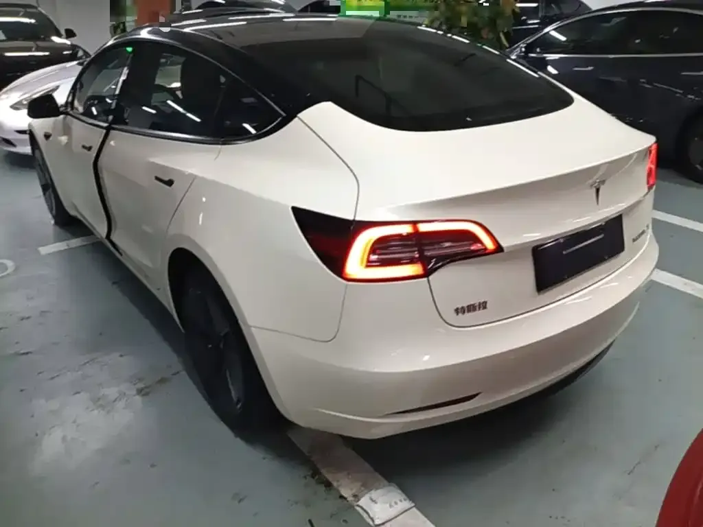 Tesla Model 3 — фото 5