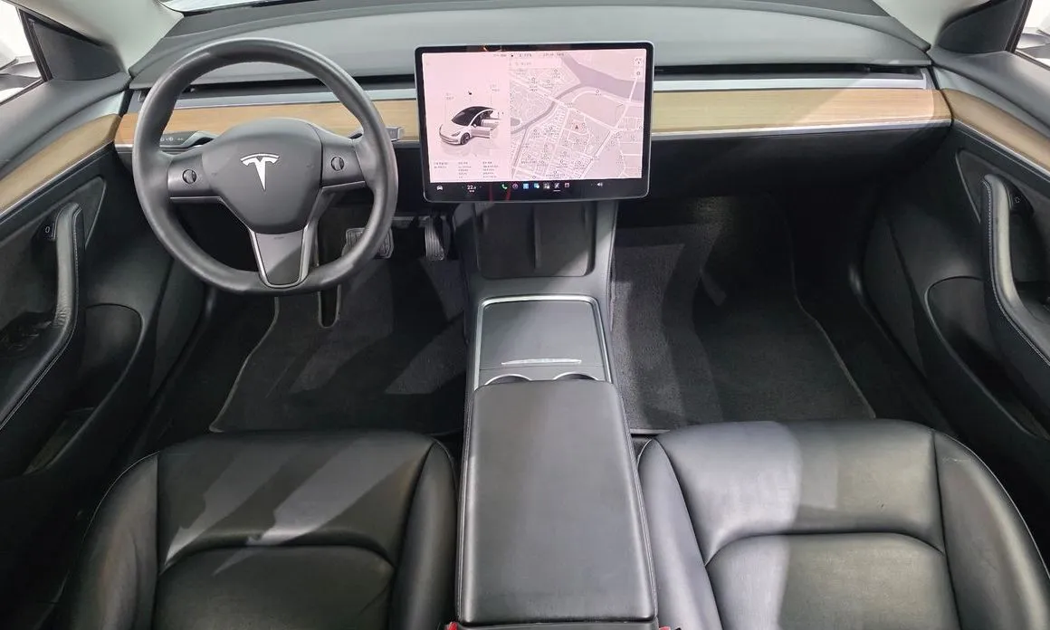 Tesla Model 3 — фото 9
