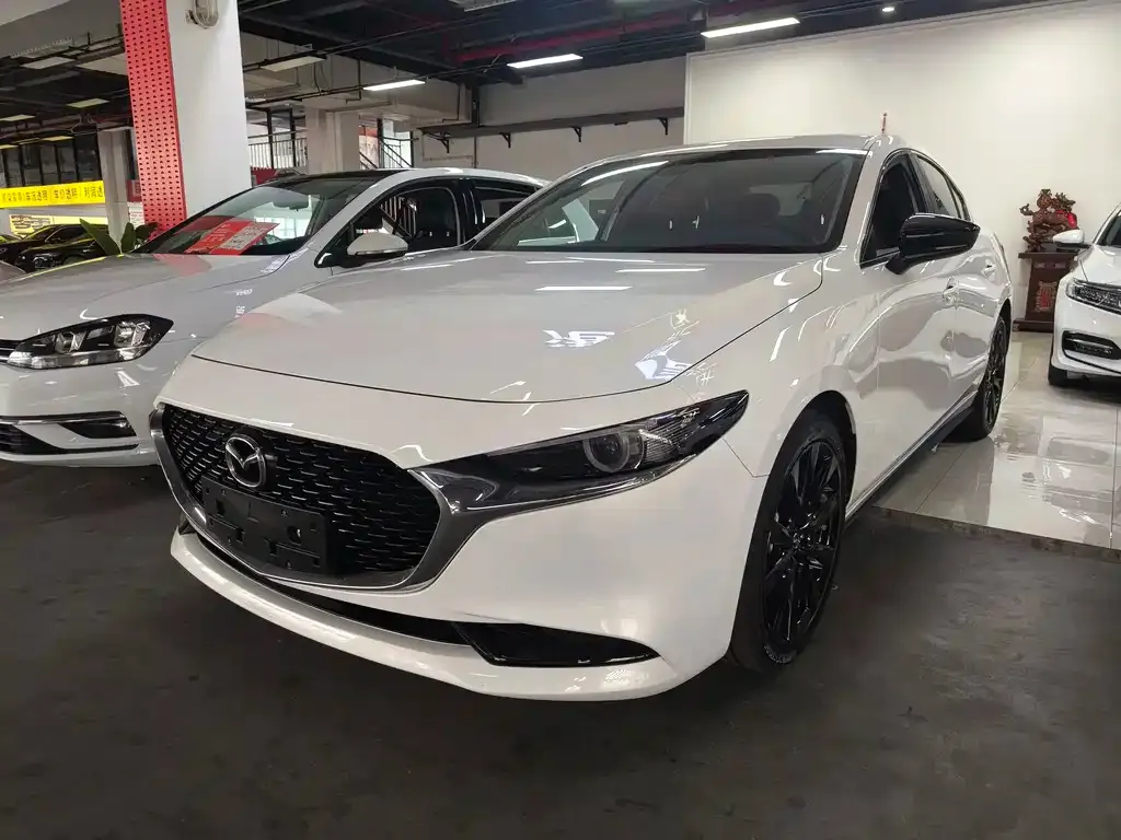 Mazda 3 Axela — фото 1