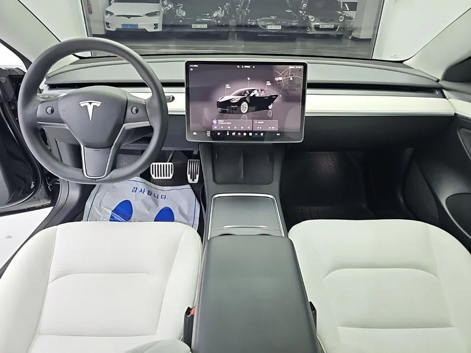 Tesla Model 3 — фото 5