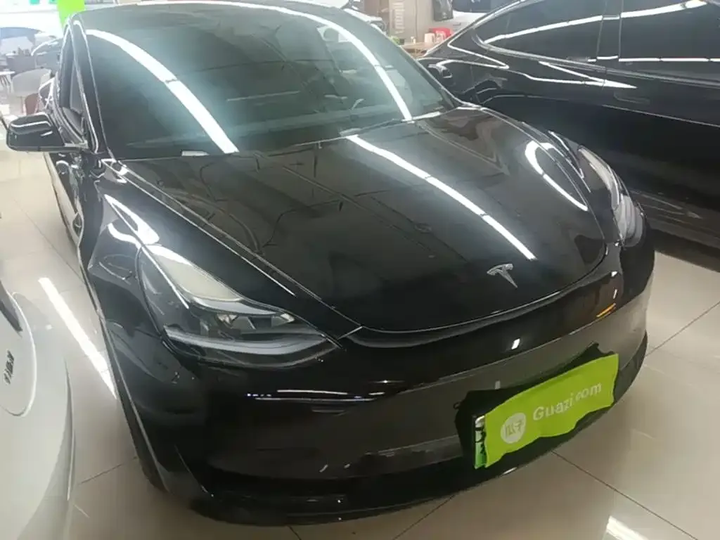 Tesla Model 3 — фото 7