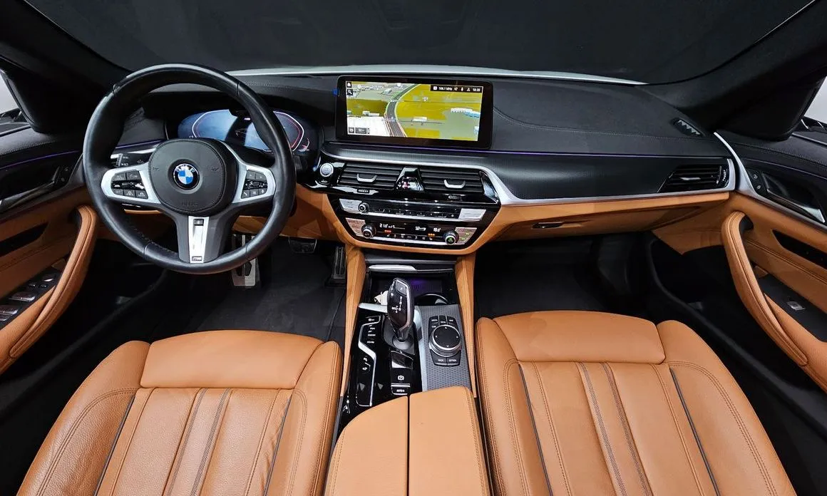 BMW 5-Series — фото 10
