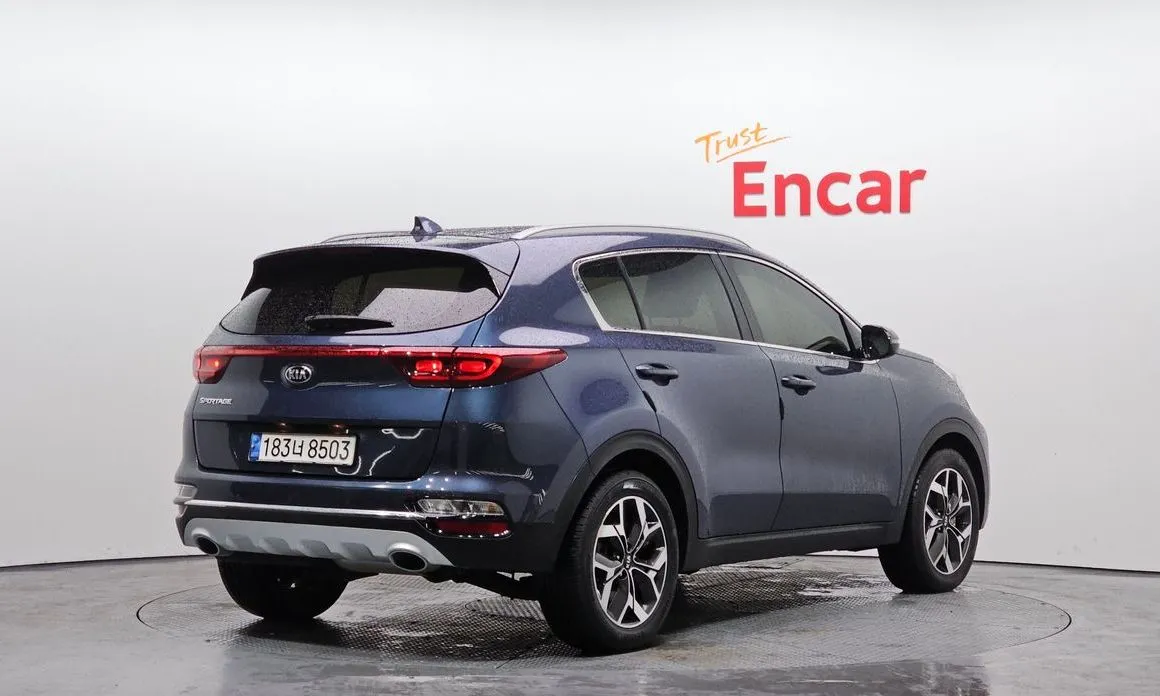 Kia Sportage — фото 9