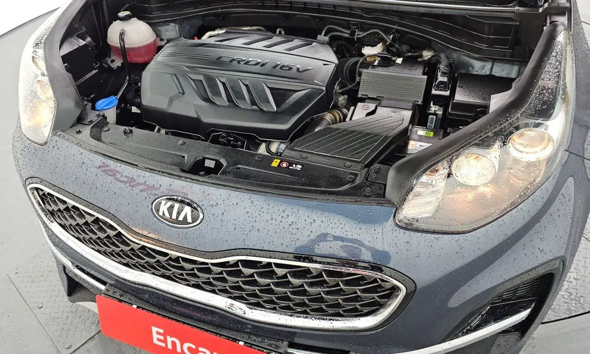 Kia Sportage — фото 10