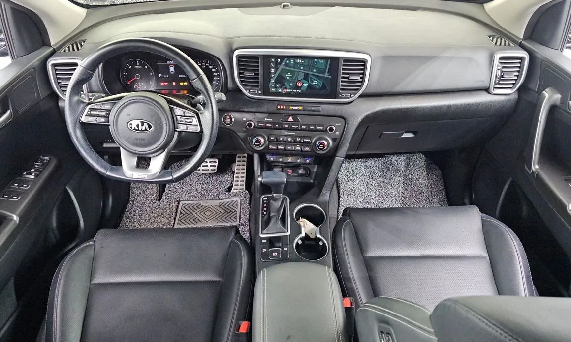 Kia Sportage — фото 8
