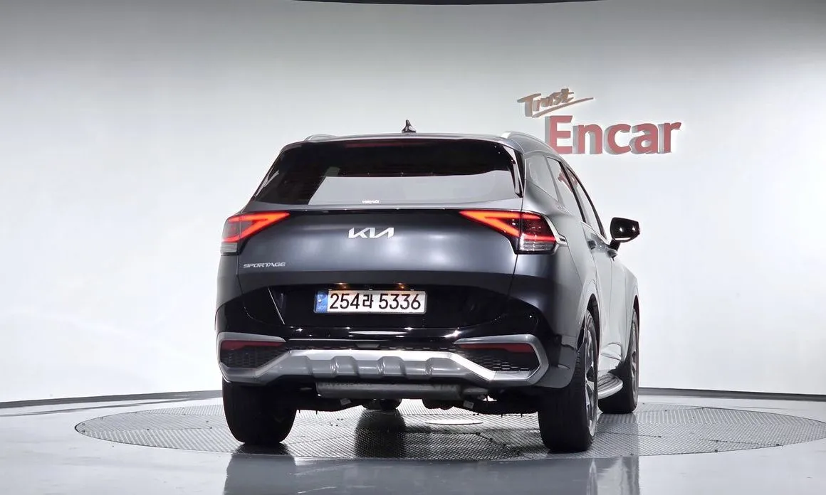 Kia Sportage — фото 10
