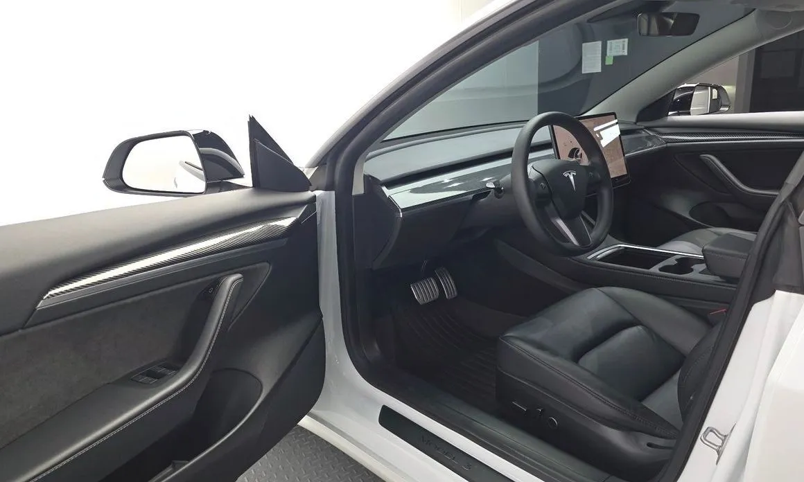 Tesla Model 3 — фото 10