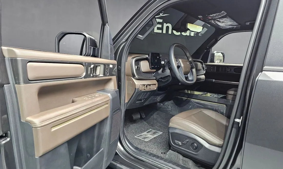Kia Tasman — фото 10