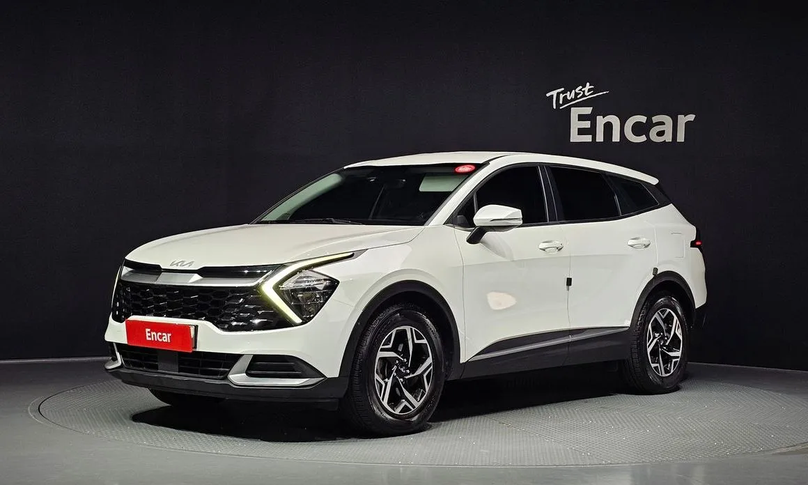 Kia Sportage — фото 1