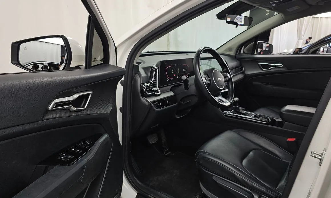Kia Sportage — фото 7