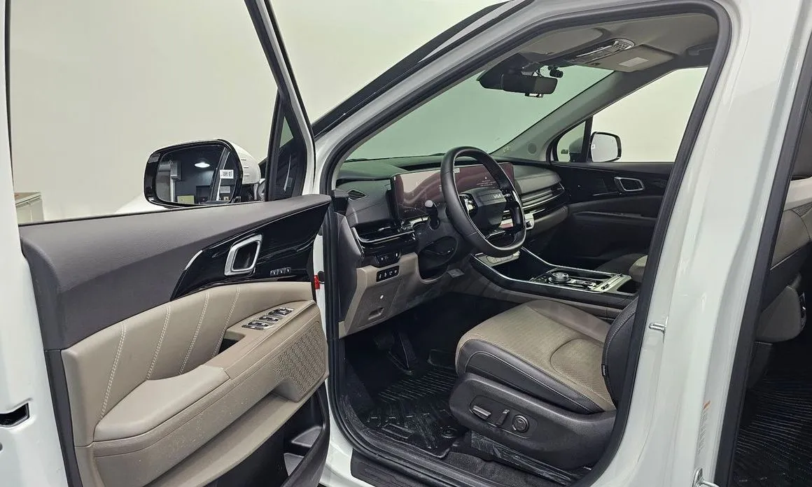 Kia Carnival — фото 10