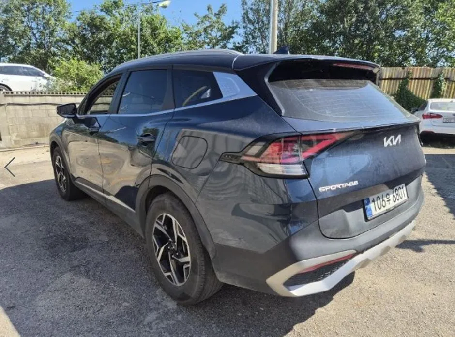 Kia Sportage — фото 10