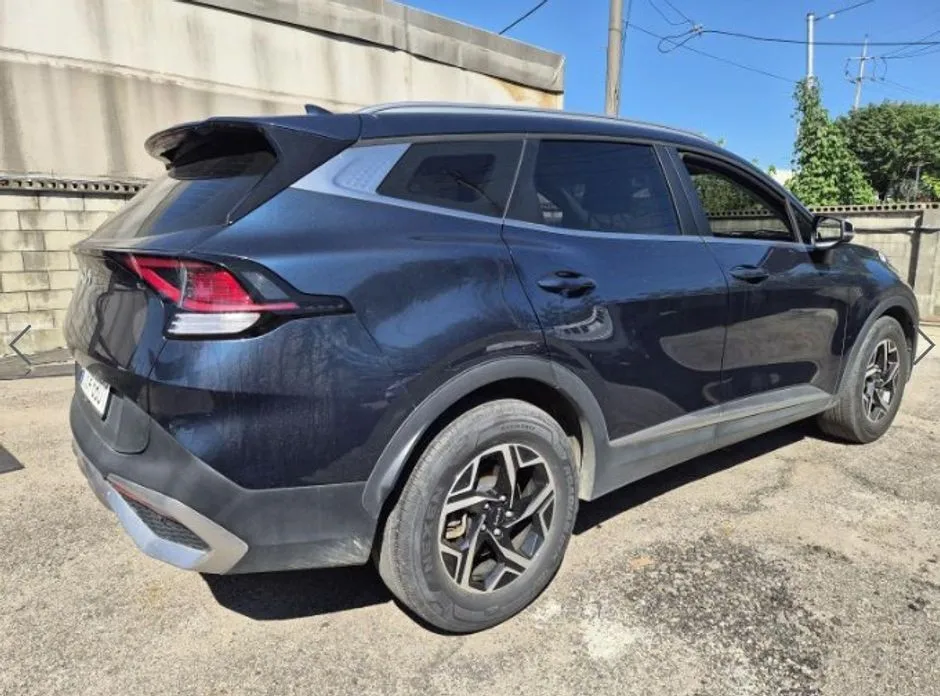 Kia Sportage — фото 7