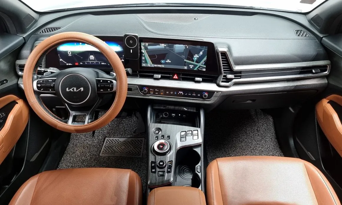Kia Sportage — фото 10