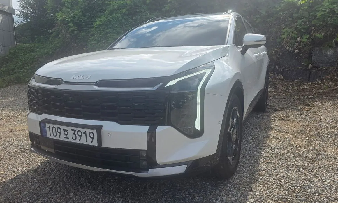 Kia Sportage — фото 1