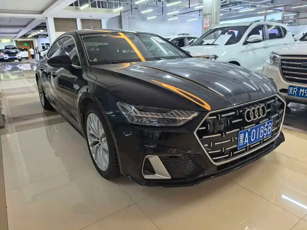 Audi A7L — фото 8