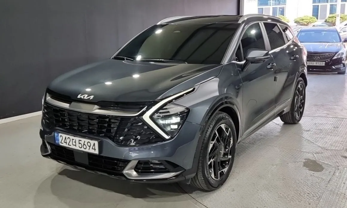 Kia Sportage — фото 1