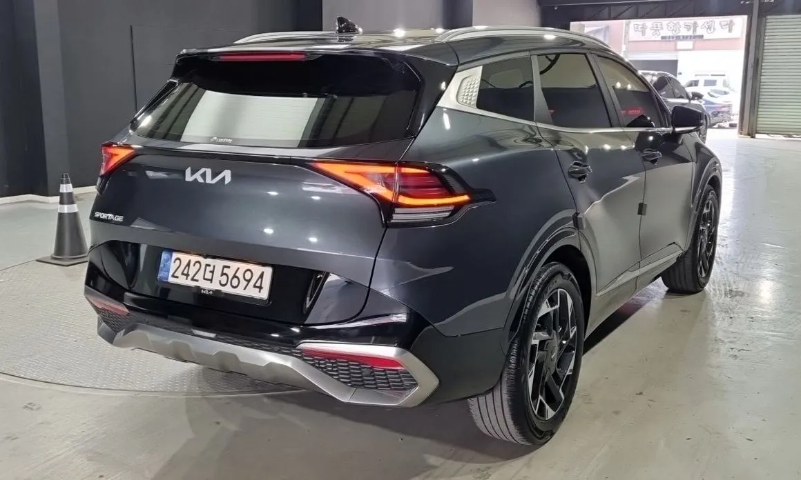 Kia Sportage — фото 10