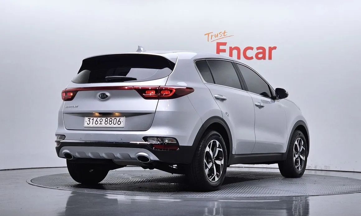 Kia Sportage — фото 7