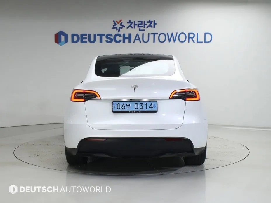Tesla Model Y — фото 8