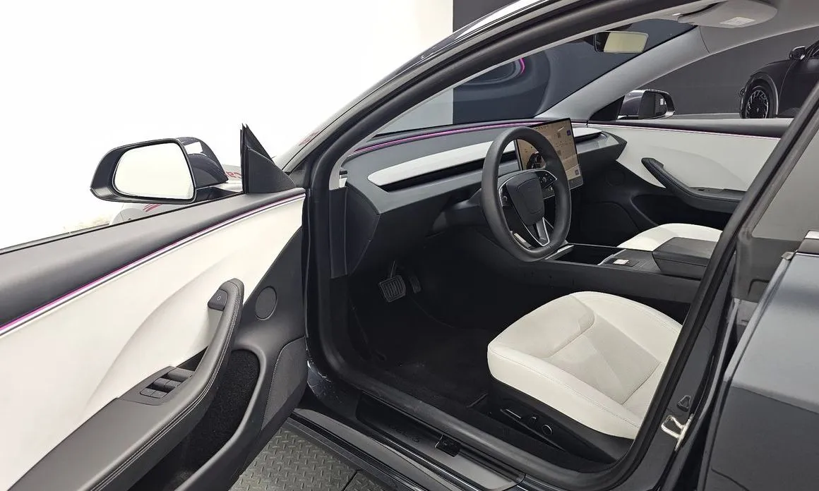 Tesla Model 3 — фото 8