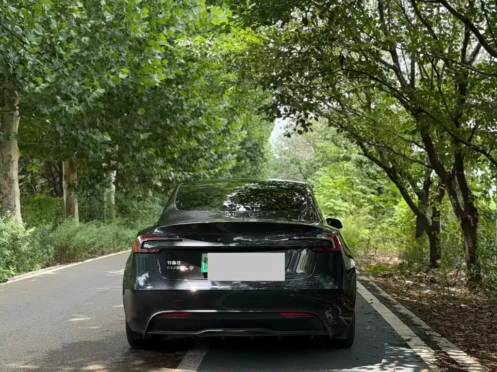 Tesla Model 3 — фото 7