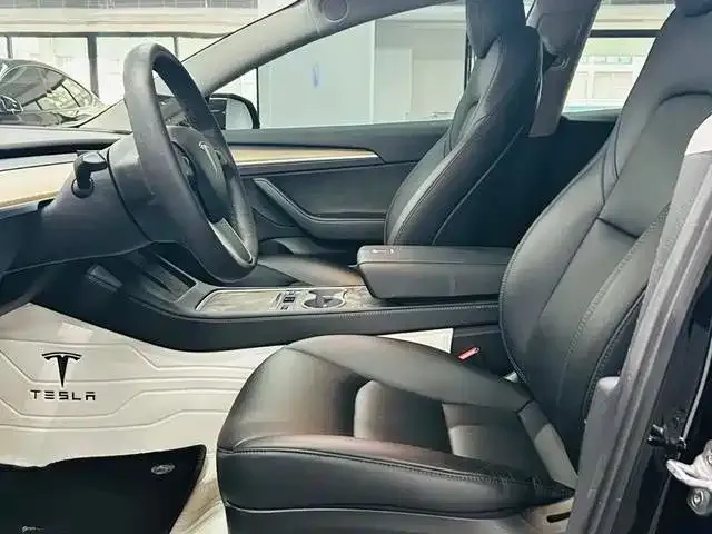 Tesla Model 3 — фото 8
