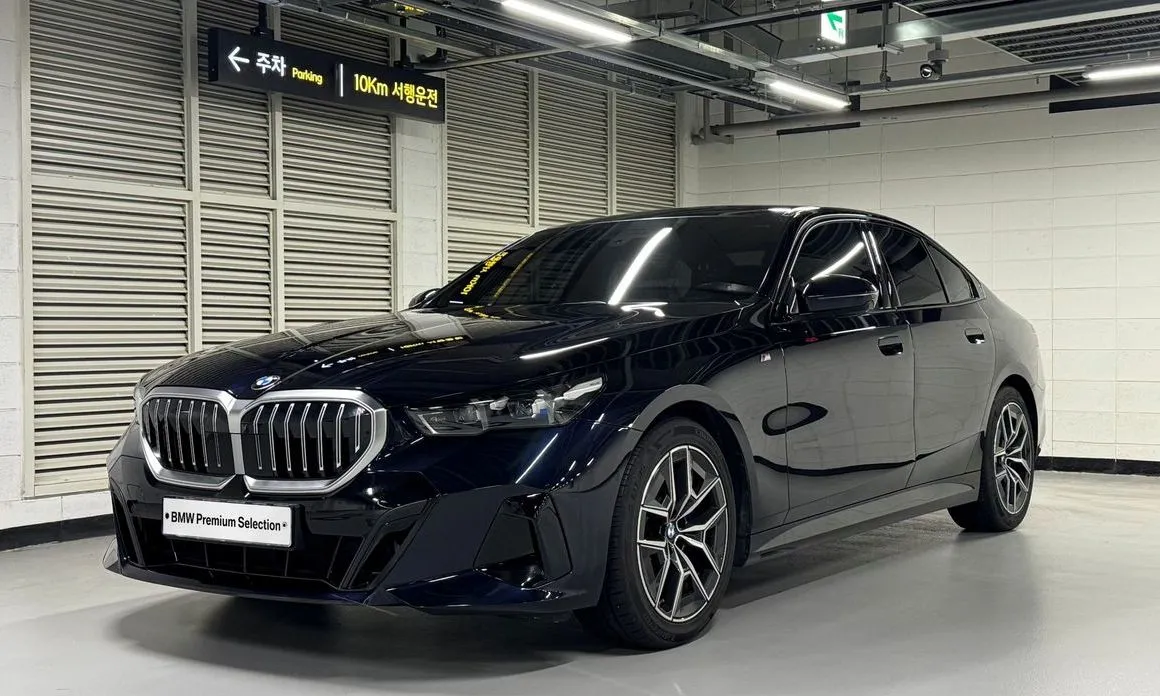 BMW 5-Series — фото 1