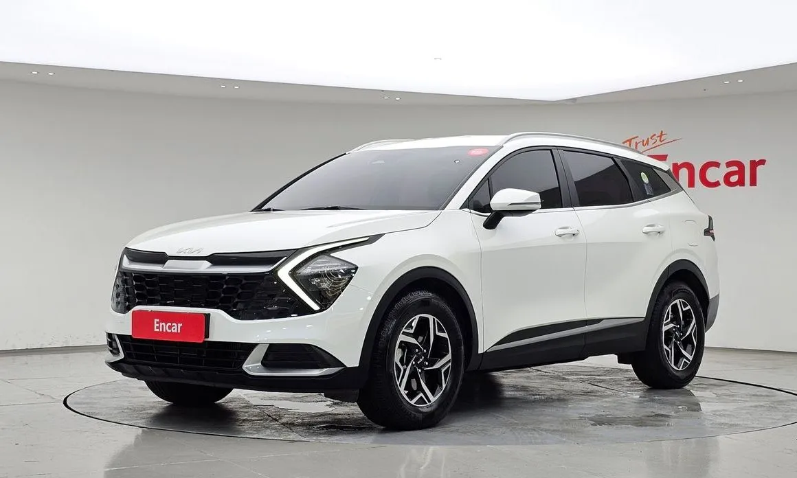 Kia Sportage — фото 1