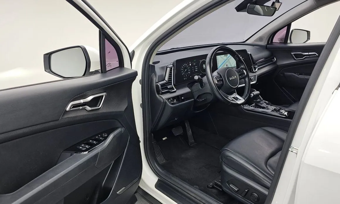 Kia Sportage — фото 10
