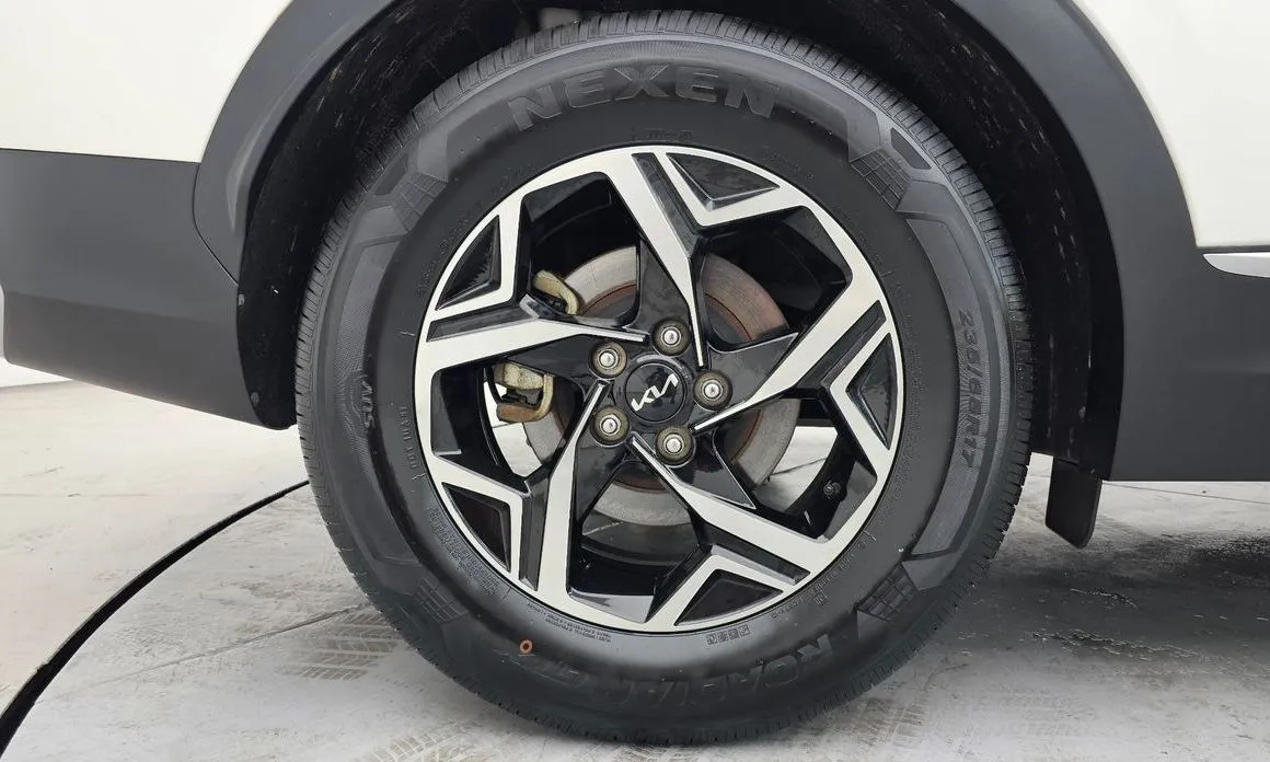 Kia Sportage — фото 9