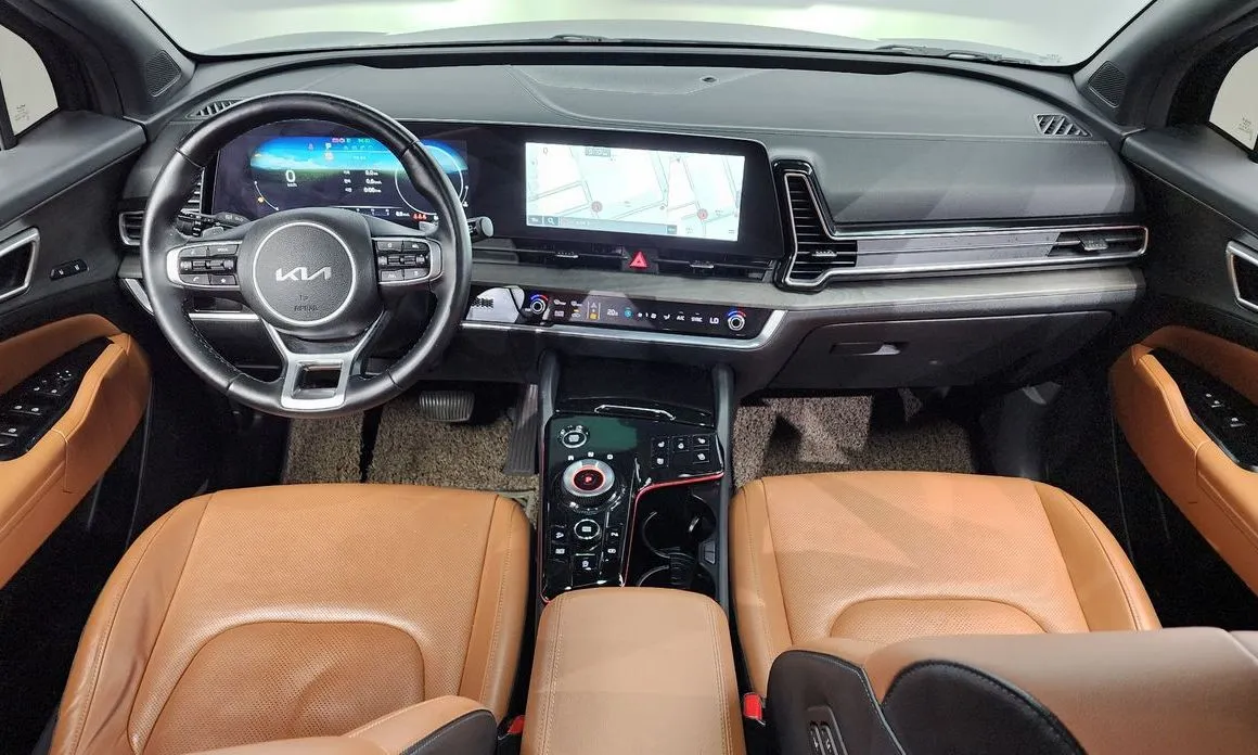 Kia Sportage — фото 9