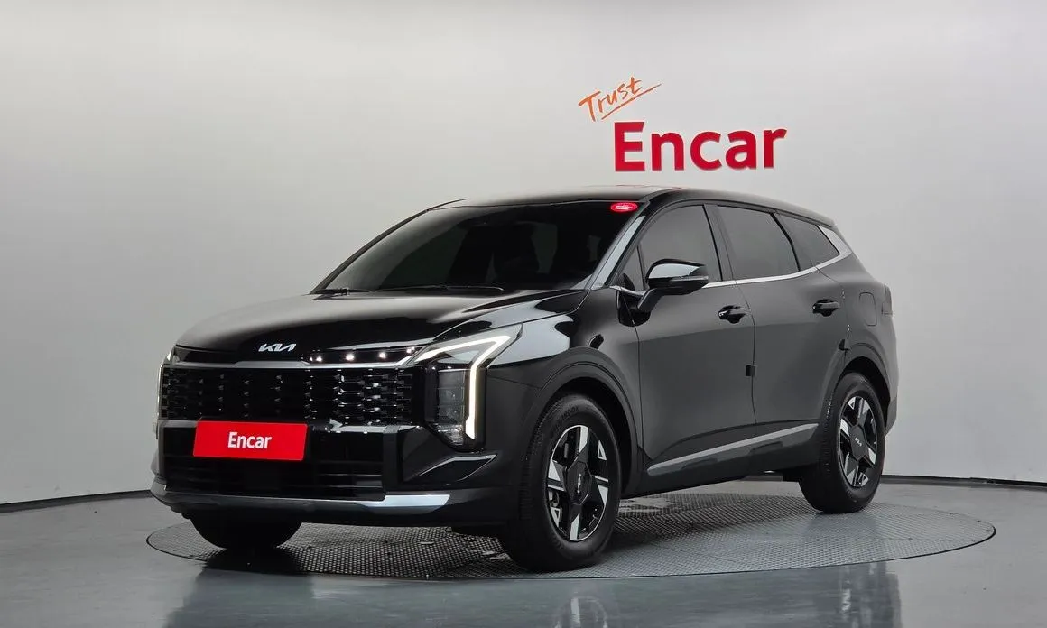 Kia Sportage — фото 1